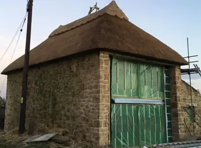 RJ Matravers Thatched building
